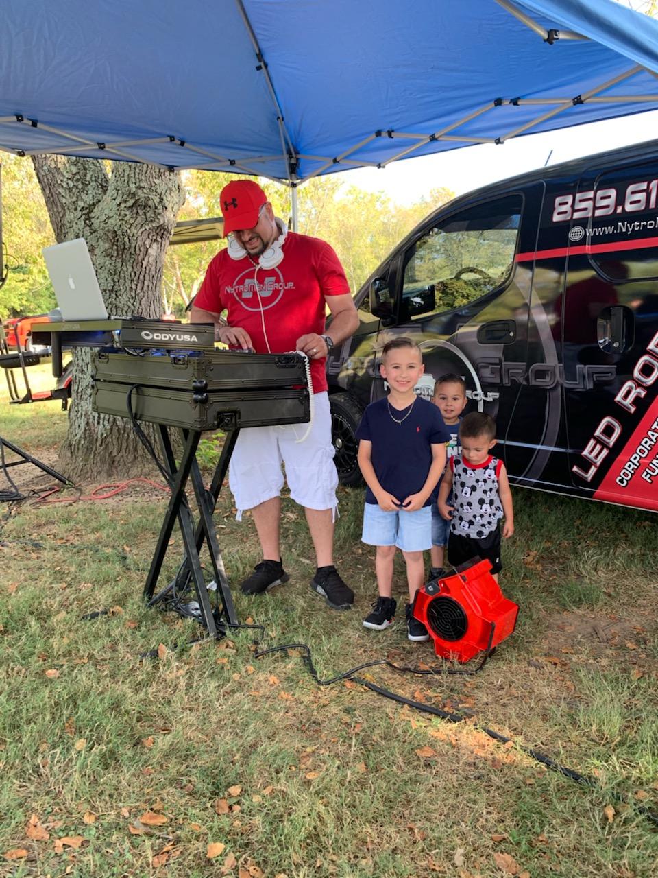 kids hanging with the DJ