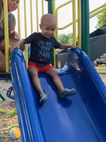 playing on the slide